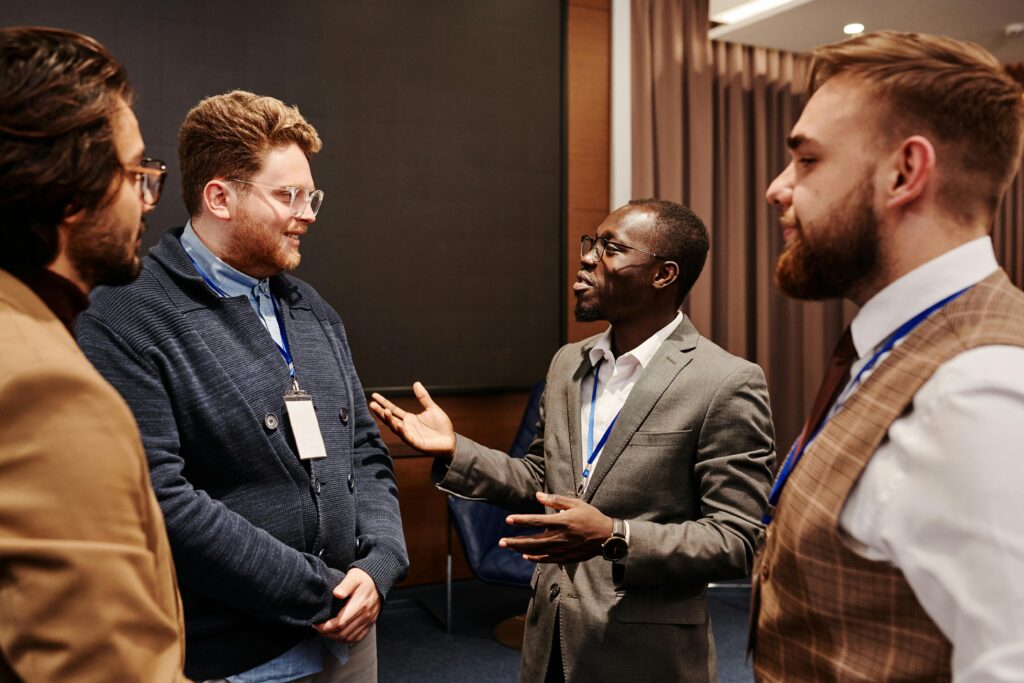 Group of diverse business professionals engaged in referral networking